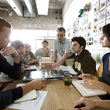 Associate Dean Brook Muller works with UO architecture students on a studio design project that aligns urban redevelopment and improved ecological function.