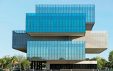 She may favor Brutalist forms...