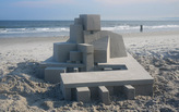 Artist Calvin Seibert races against time in building these modernist sandcastles