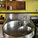 Her custom stainless steel kitchen sink, which is inset with a mixing bowl and bucket. Annie Schlechter