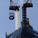 The first section of a 408-foot spire is hoisted by crane to the top of One World Trade Center, Wednesday, Dec. 12, 2012 in New York. The spire will be fully assembled in 2013 and the tower will top out at 1776 feet. (AP Photo/Mark Lennihan)