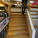 The Regional Library of Lapland. Jennifer Wong on sunken reading room stairs.
