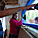 Students installing custom-made windows