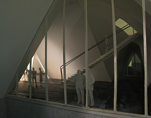 View into the main hall, stairway to the public gallery.