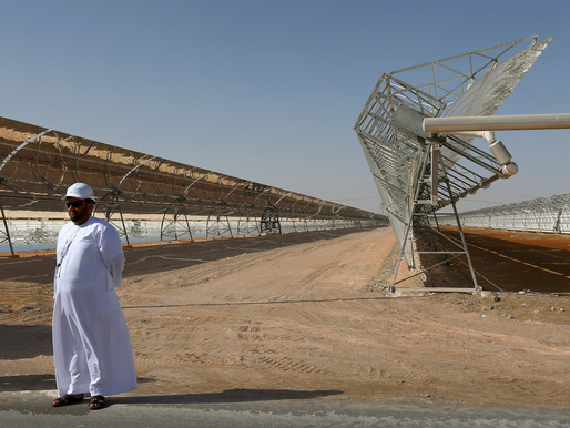 Rows of parabolic mirrors at the Shams 1 plant in Abu Dhabi. (Marwan Naamani/AFP/Getty Images)