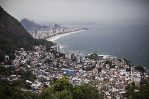 Views of Ipanema Beach and the South Zone in Rio are seen from Vidigal. An eco-friendly hotel is under construction in the favela. The hotel, which will hire local workers, is part of a massive gentrification process underway in a neighborhood once wrought with violence and drug traffickers. (Lianne Milton for NPR)