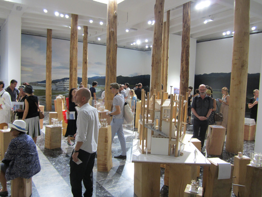 Japan Pavilion with the final design of the community house in the foreground