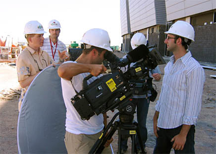 Super Stadium: Danny signs up with the construction crew hustling to complete the Eisenman-designed Arizona Cardinals football stadium before opening day. This stadium is the first in America with a field that actually slides completely in and out of the building - on railroad tracks!
