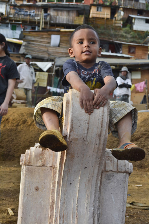 Children playing with the caballitos