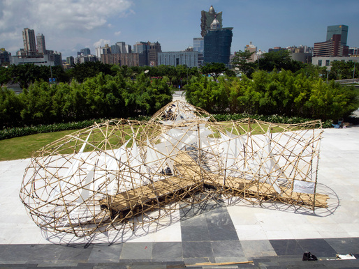 Pulse Pavilion with Macau skyline