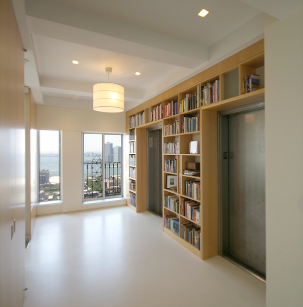 Elevators open directly into foyer with New York Harbor view