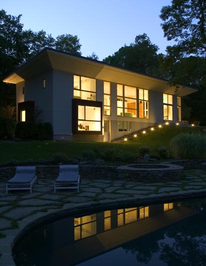 pool and rear facade at dusk