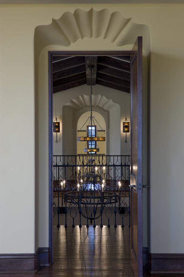 Upper Level Interior View across Stair Hall to Balcony overlooking Entry Tower