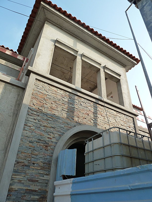 05/14/11: Front Facade tiling in progress