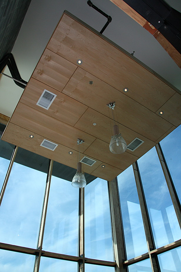 The clearstory of The Green Building is used as an office conference room. The glass has 30% recycled content and the aluminum frame around each window has 70% recycled content. 