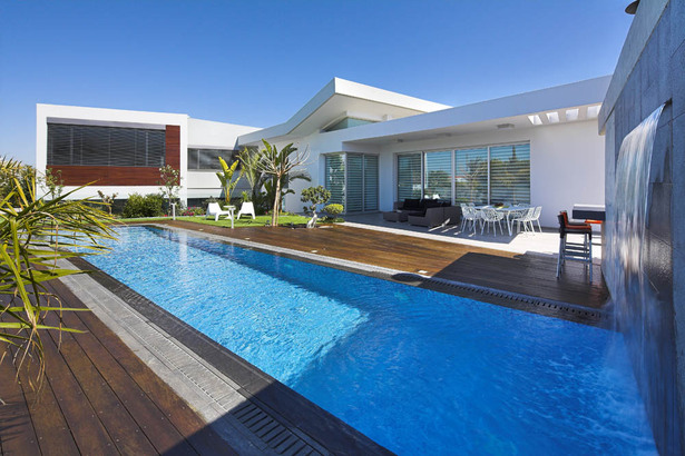 view across the pool towards the house