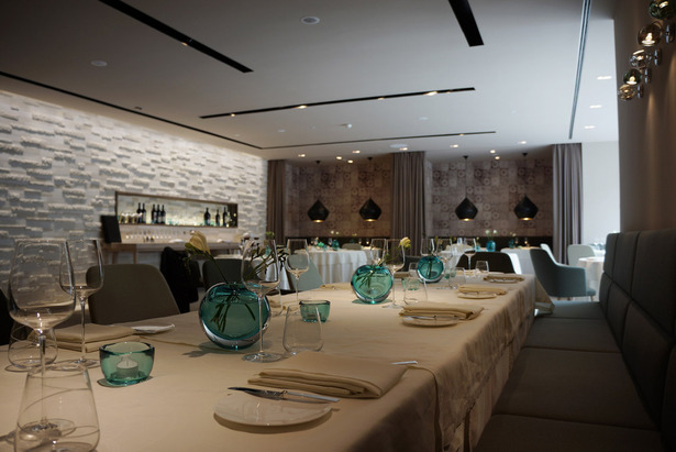 The area of the gourmet restaurant once has been the production area for the butcher shop.