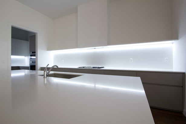 GLAM Kitchen: smooth matte gray Lacquer and CaesarStone quartz countertop.
