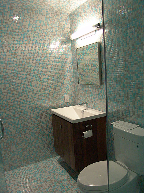 Bathroom remodel with solid walnut casework