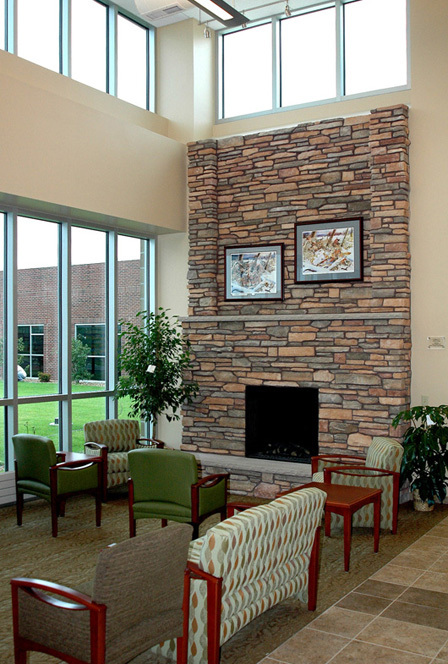 Lobby waiting with fireplace.