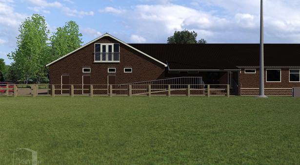 View of pitch-side access to changing rooms and covered entrance to main function room.