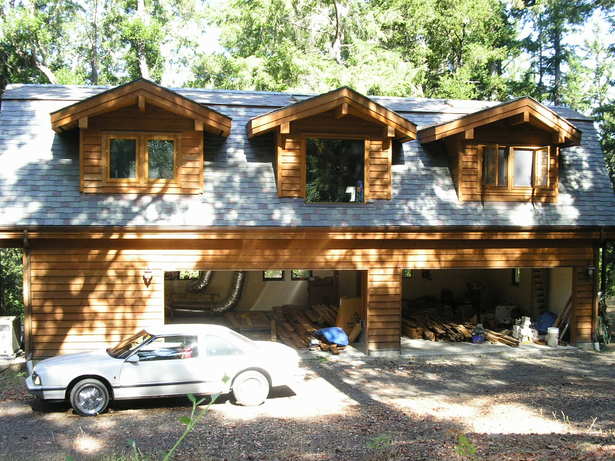 4 car Garage, Bathroom, mechanical room and stairs on left
