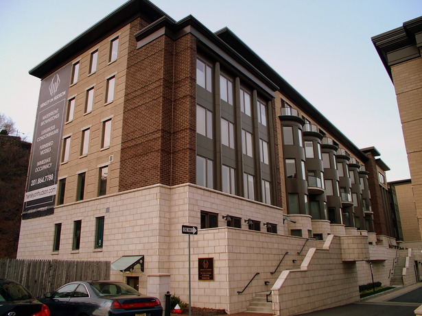 SOUTHEAST CORNER VIEW OF TYPICAL CONDOMINIUM BUILDING