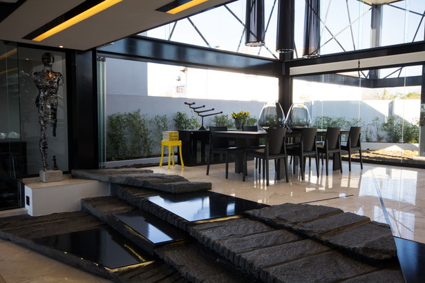 The granite and steel stairs from the dining area to the living room.