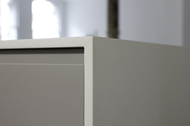 GLAM Kitchen: smooth matte gray Lacquer and CaesarStone quartz countertop.