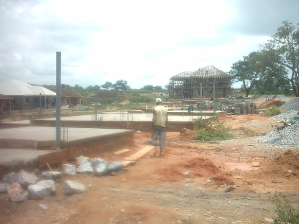 One of the 2-story already being roofed.