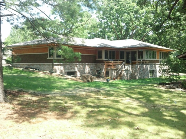 Multiple, triple-glazed, highly insulated windows to the south collect the sun's heat in the winter and are completely shaded by the large overhangs on hot summer days.