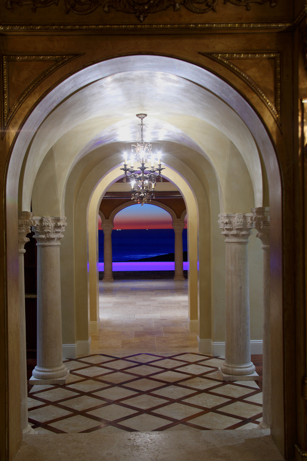 Axial View through Central Hallway to Infinity Edge Pool with Harbor Beyond