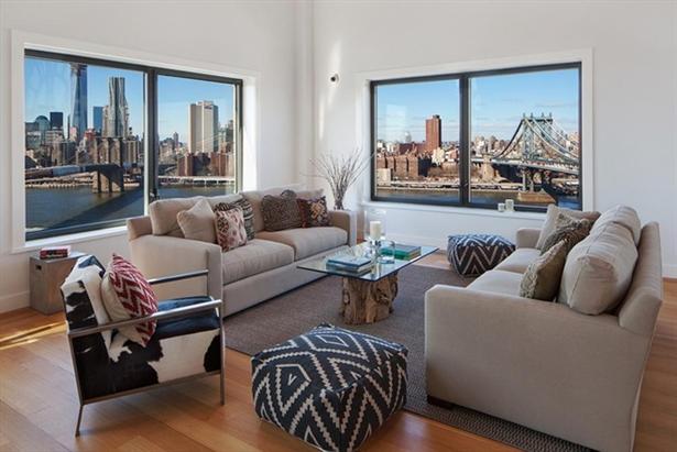 The Clock Tower - living room overlooking the Brooklyn Bridge and the Manhattan Bridge