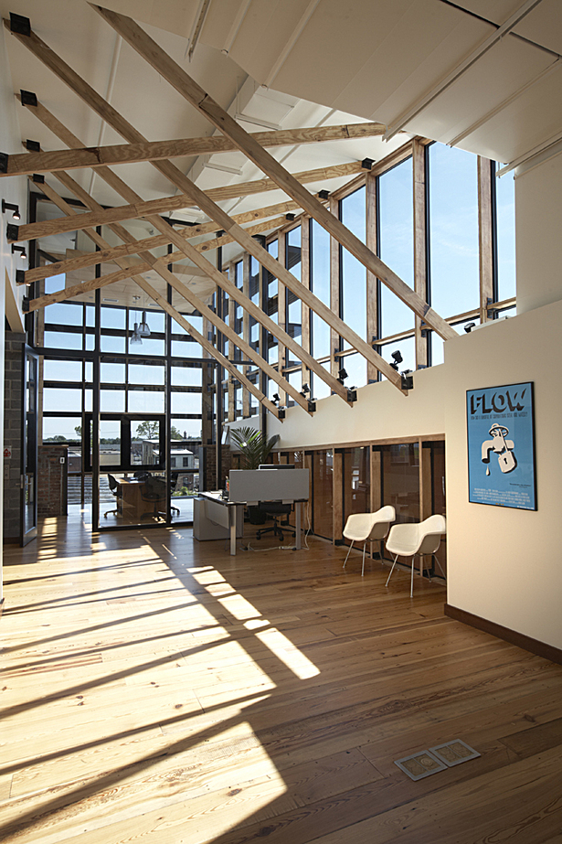 Old growth lumber was inventoried and incorporated into the structural design of the new building. In the office spaces on the second and third floors, old framing lumber has been reused in the new framing and all new wood is Forest Stewardship Council certified and harvested locally.