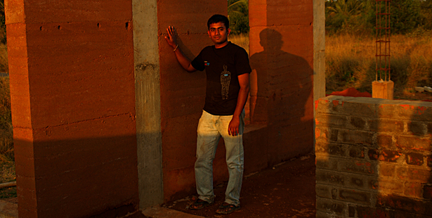 architects first rammed earth walls; self built