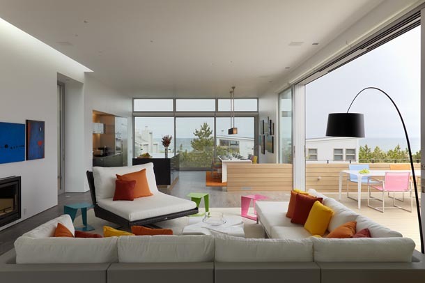 living space with kitchen beyond