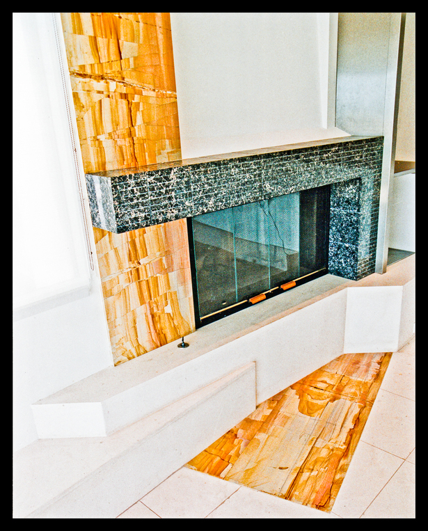 Fire place with 3 different stones, angular geometry.