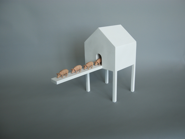House With Four Exiting Piglets