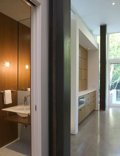 powder room with kitchen beyond
