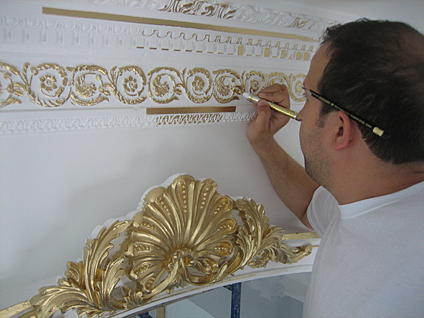 Gold leaf paint over plaster