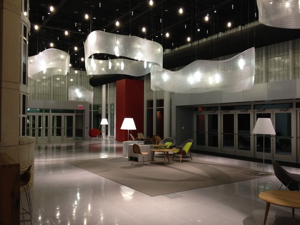 North perspective at night with some furniture.