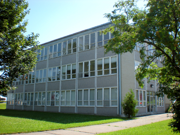 Existing photo of the building in its derelict state