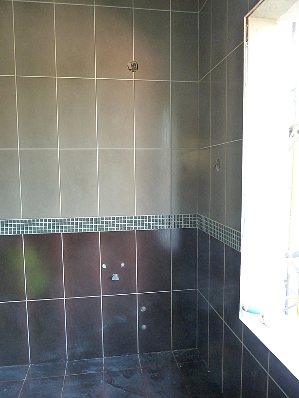 05/06/11: Tiling completed in Bathroom #6