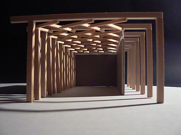 View sans wall of building enclosure and columns