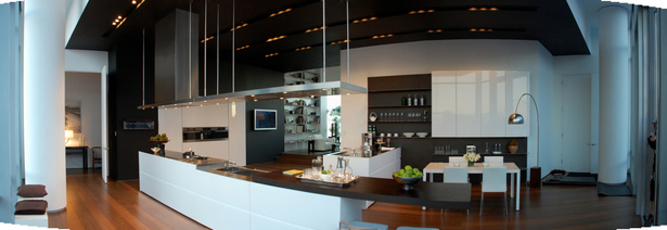 Doors: White Glossy lacquer, 22 mm (3/4”) thick with 30° top edge Sliding Counter: Thermo Oak with electronic movement (counter thickness 8cm = 3 1/8”) Counters: Hand crafted brushed stainless steel, 3 mm (1/8”) thick with soldered sinks and retractable faucet Hood: Custom by Minimal Open Shelving: Thin stainless steel shelving system 6mm (1/4”) thick with Thermo oak back panels
