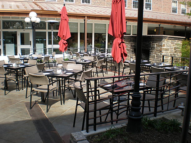 Outdoor Dining with Custom Railing and Fireplace