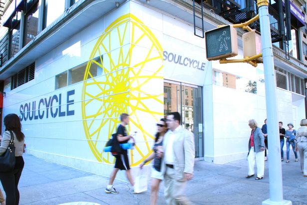 branded storefront signage and new exterior storefront to match existing