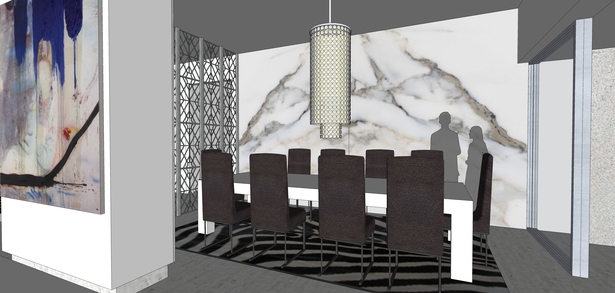 This dining room is part of the open plan kitchen space, and distinguished by the marble accent wall.