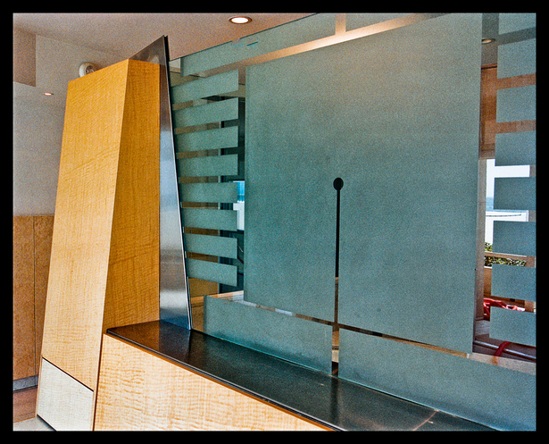 blasted glass partition between bed and tub area