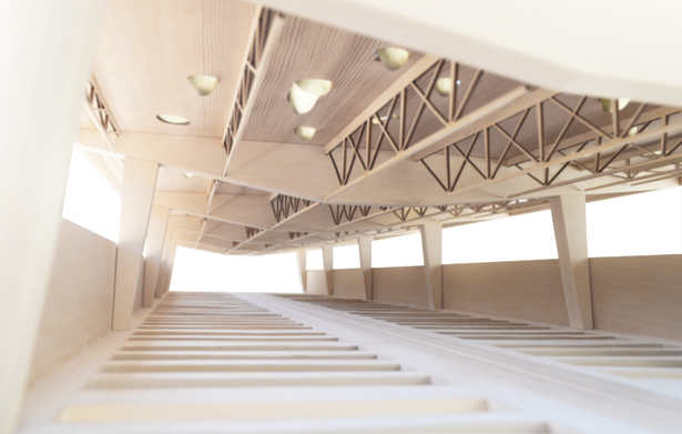 A gallery of servers immersed in pools of mineral oil stretches below a vast roof filled with mechanical infrastructure.